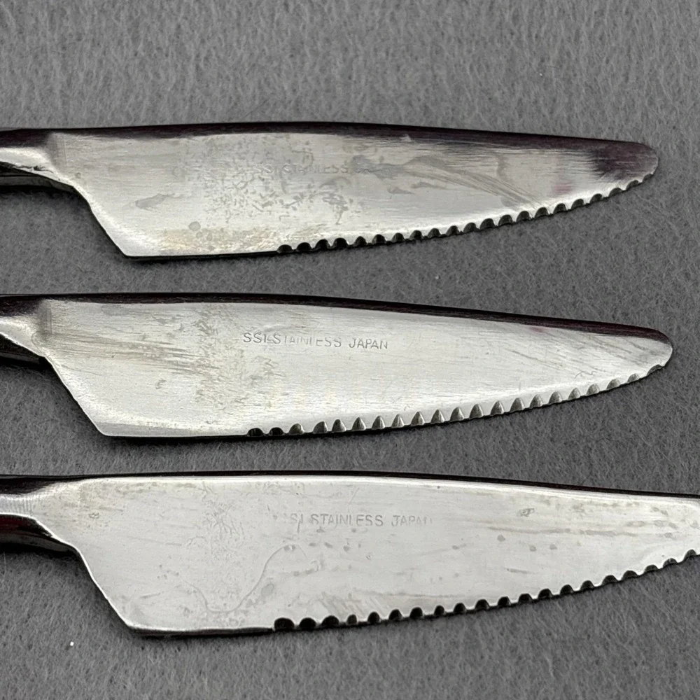 SSI Stainless Japan Black Canoe Style Resin Handle Serrated Edge Dinner Knife 6‎